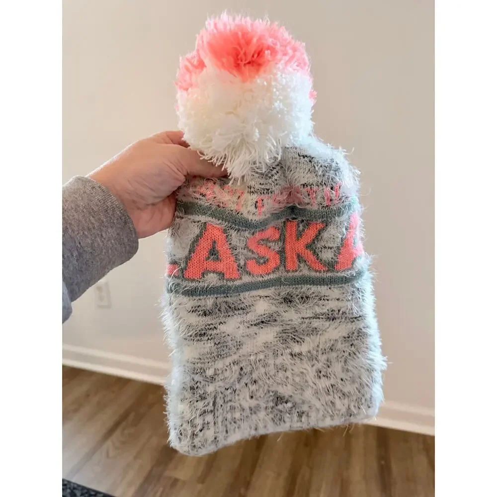 Robin Ruth Alaska heavy weight knit beanie hat with a variegated pink pom pom